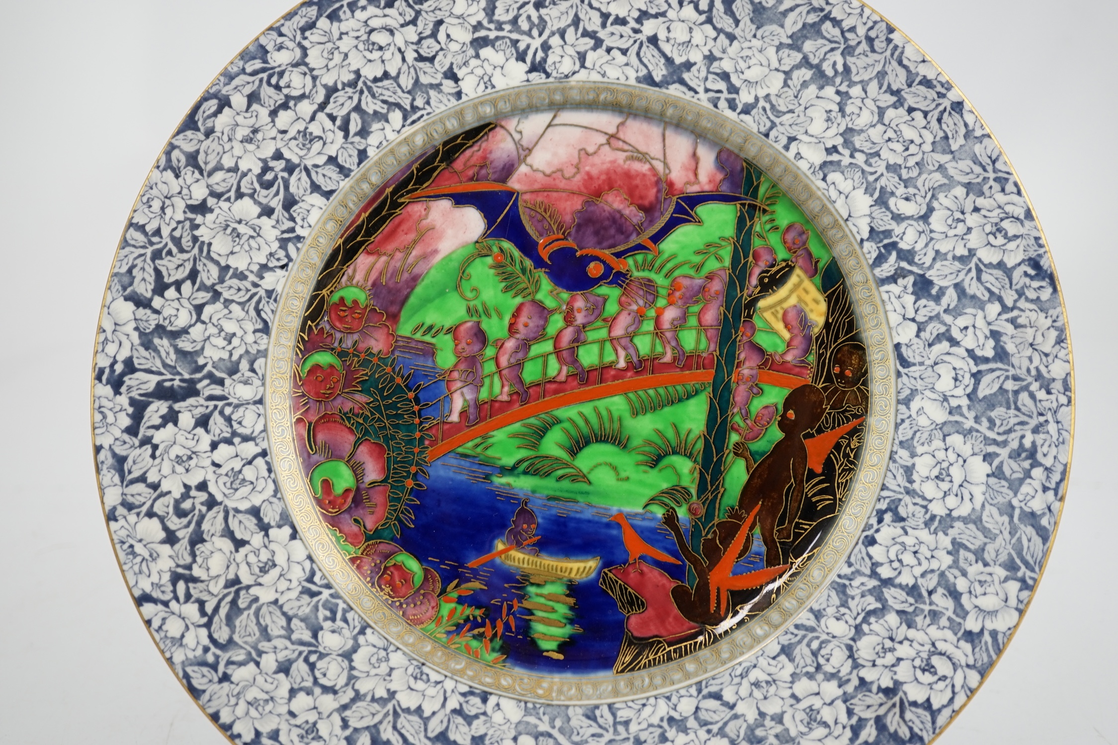 A Wedgwood Fairyland lustre ‘Lincoln’ plate, designed by Daisy Makeig Jones